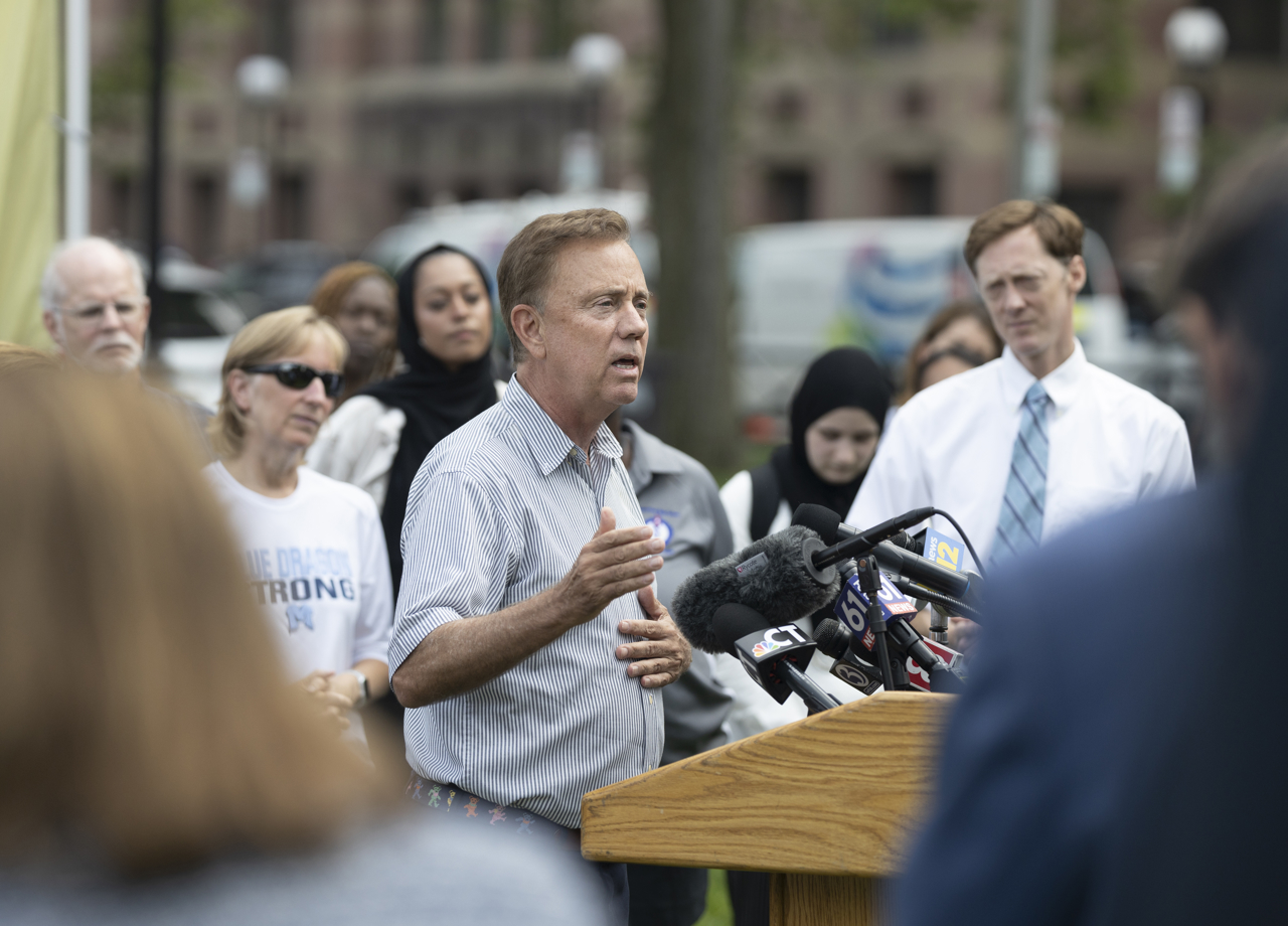 College Corps students set to begin vaccine outreach among New Haven residents were acknowledged at a press conference held by Gov. Ned Lamont