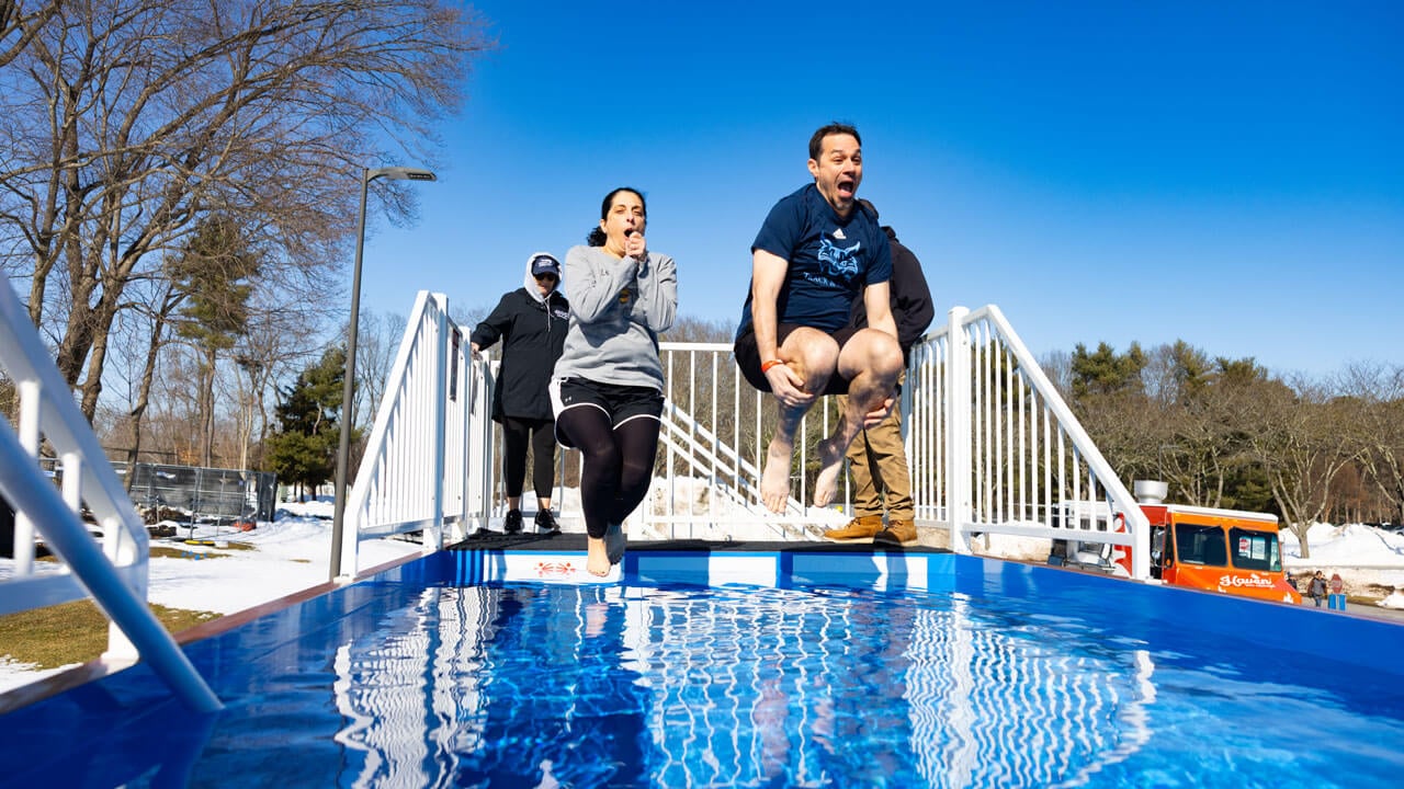 Students jump into polar plunge water