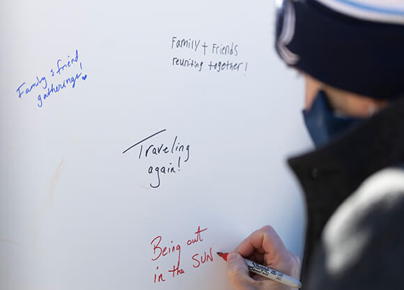 Student signs wall of hope