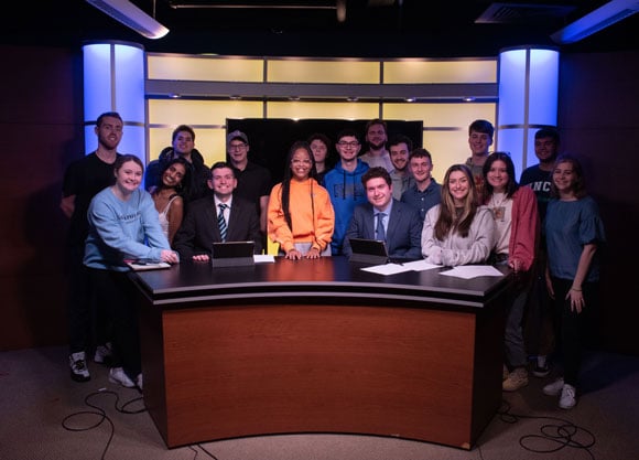 Sports Paws group in front of the new q30tv set