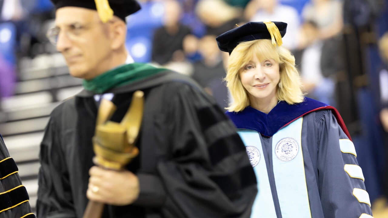 Judy Olian walking