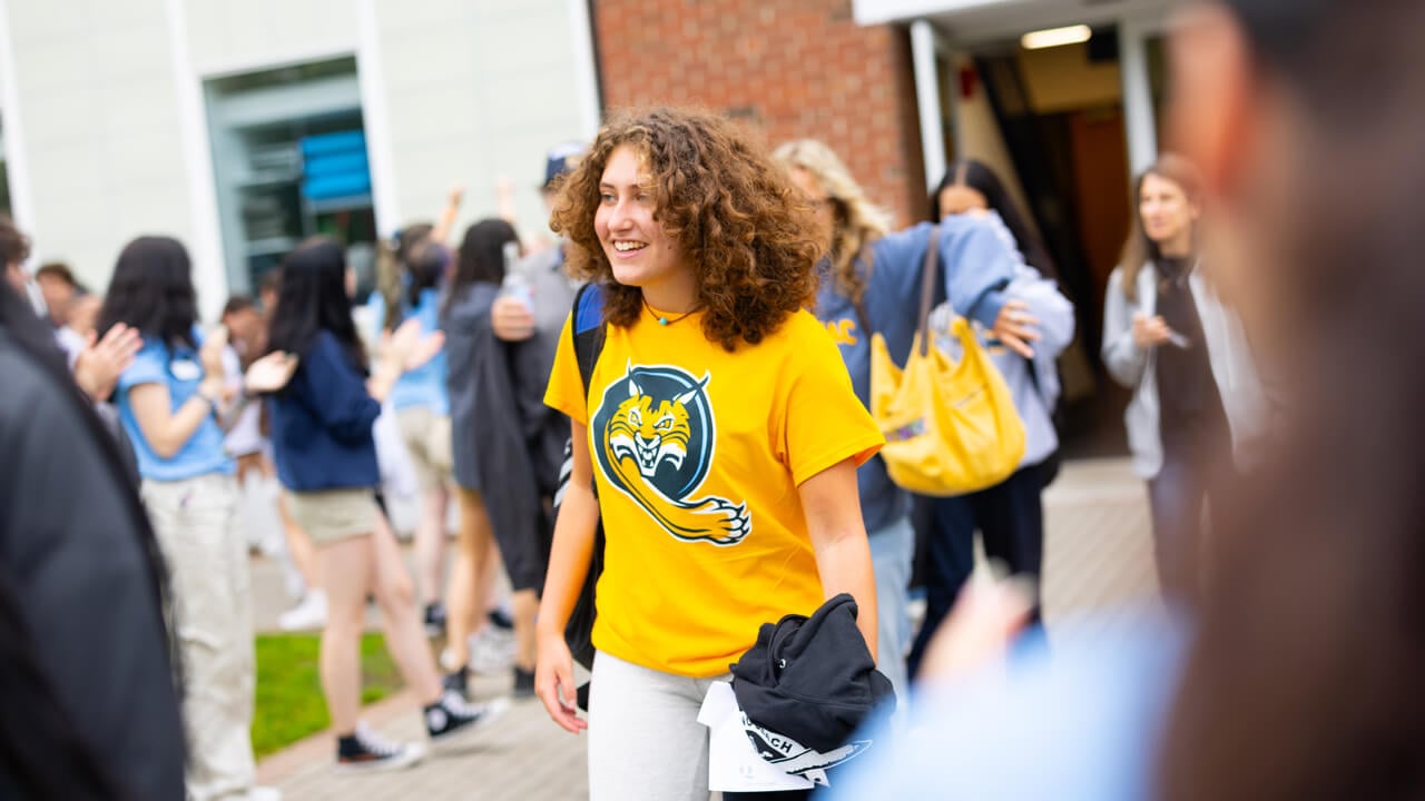 Individual walking out of the Recreation and Wellness Center