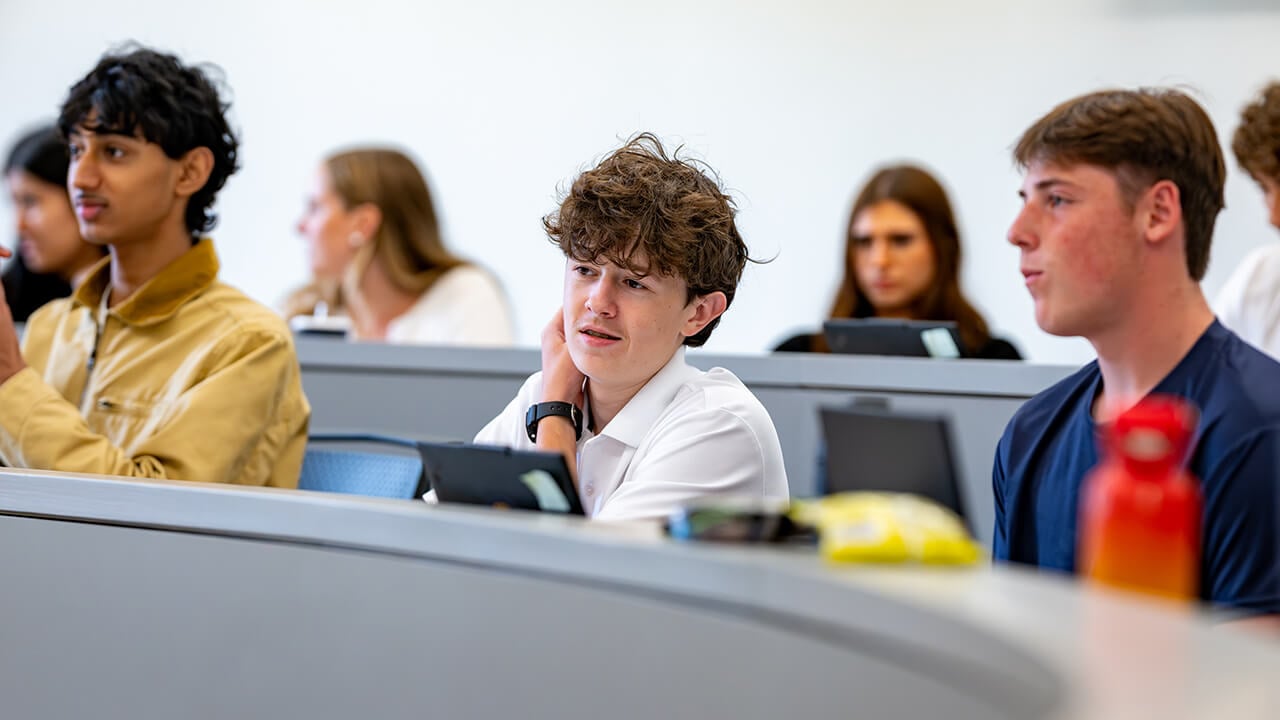 Students sitting in a lecture classroom