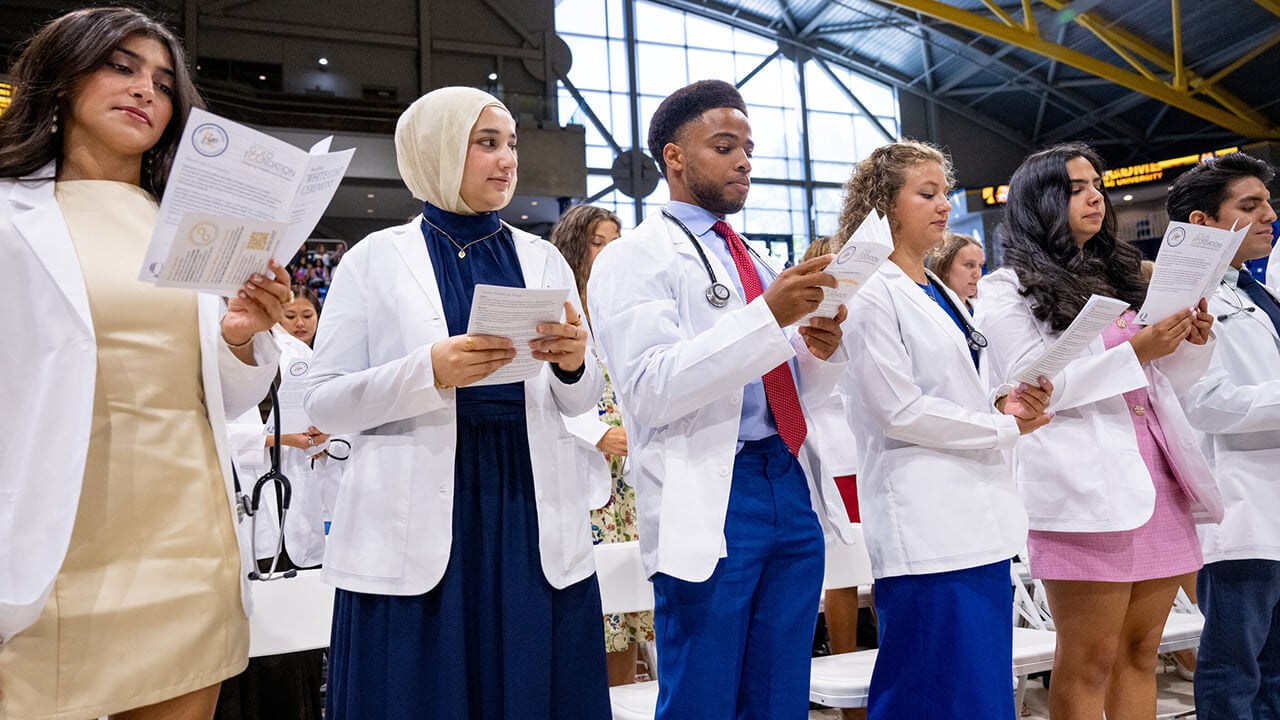 Students participate in the Frank H. Netter MD School of Medicine White Coat ceremony.