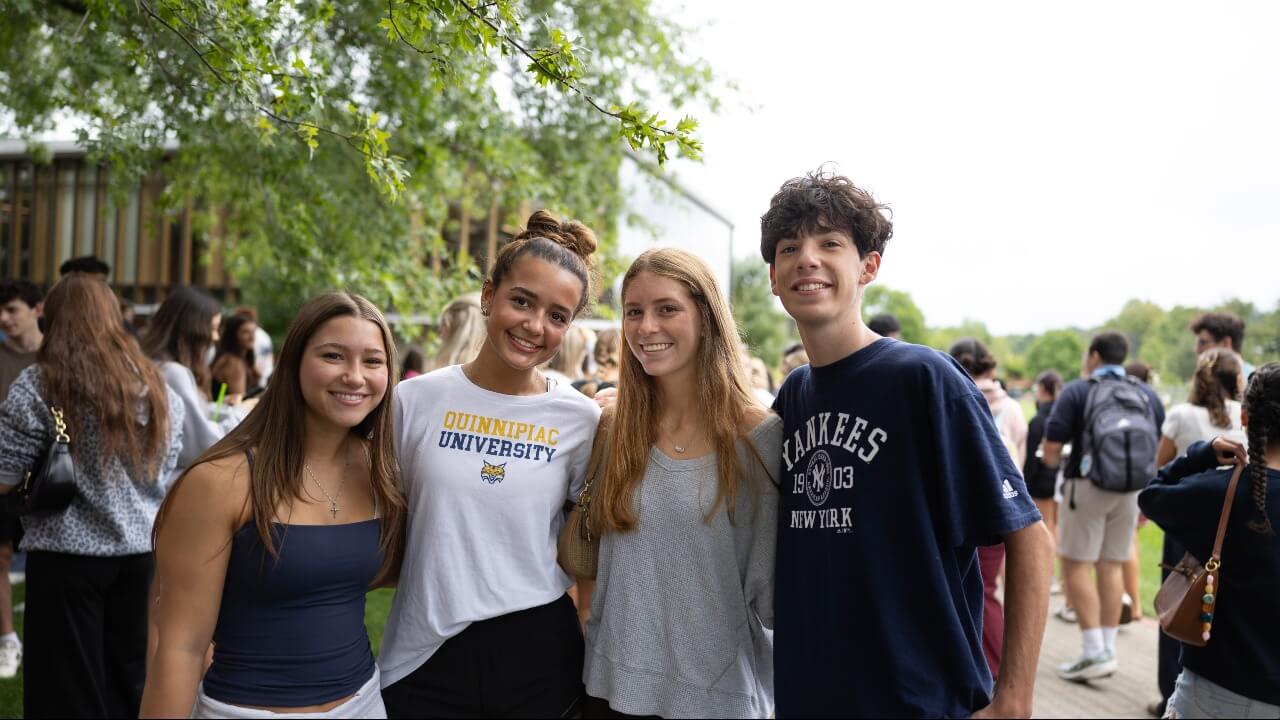 Class of 2030 students pose together for a photo