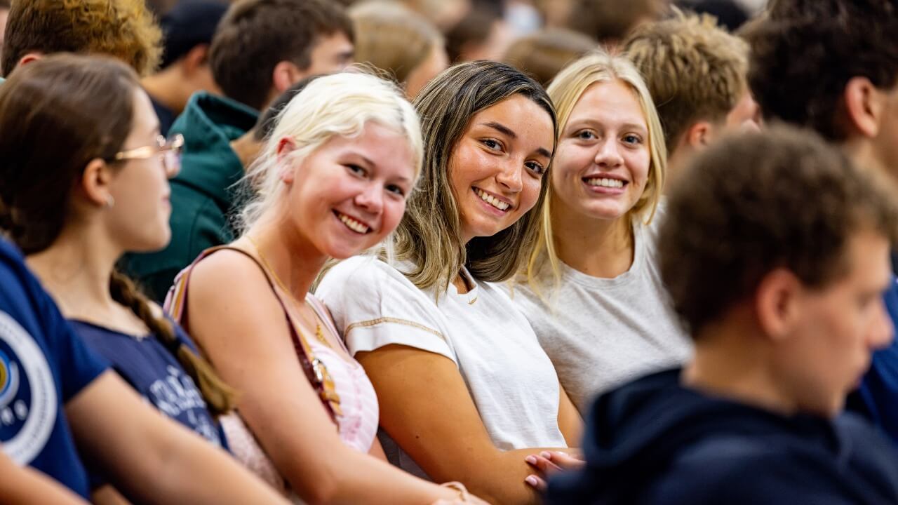 Class of 2030 students smile in crowd