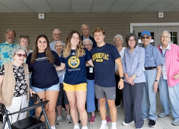 Students and Masonicare residents posing for a photo