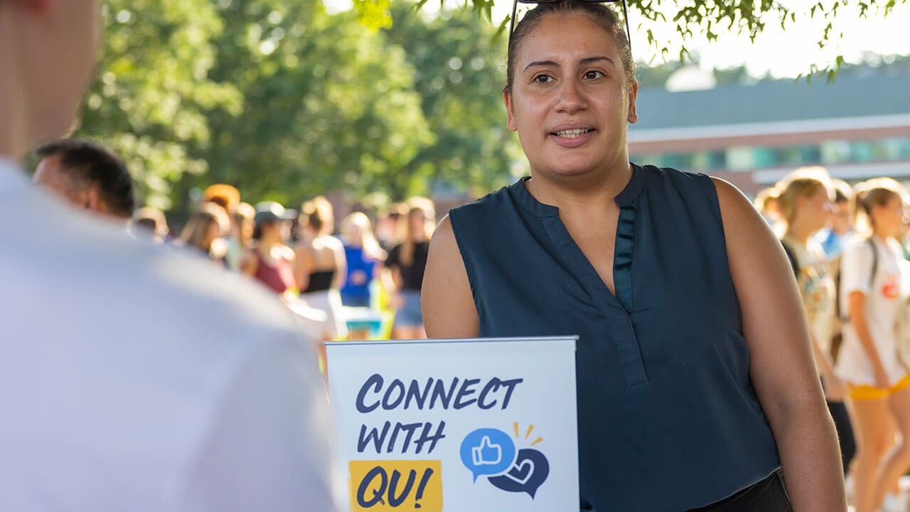 A student learns more about connecting with the Quinnipiac community