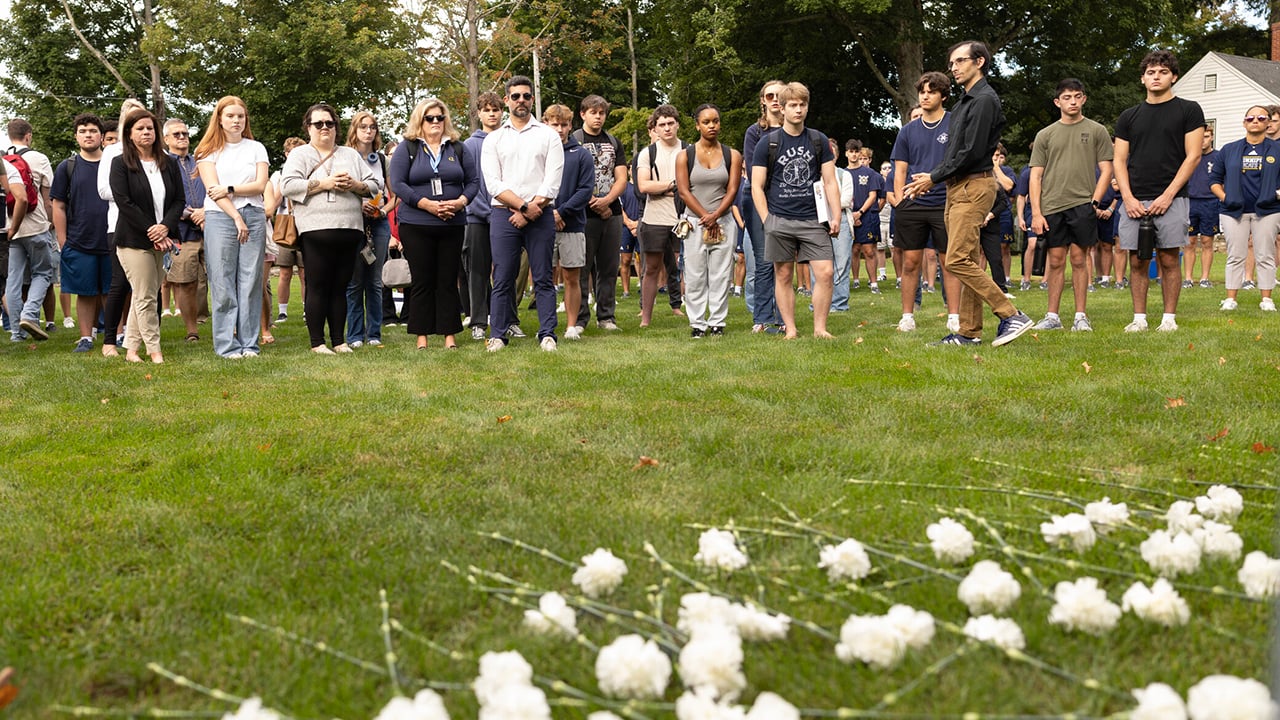 University community gathered around the signs for those who lost their lives
