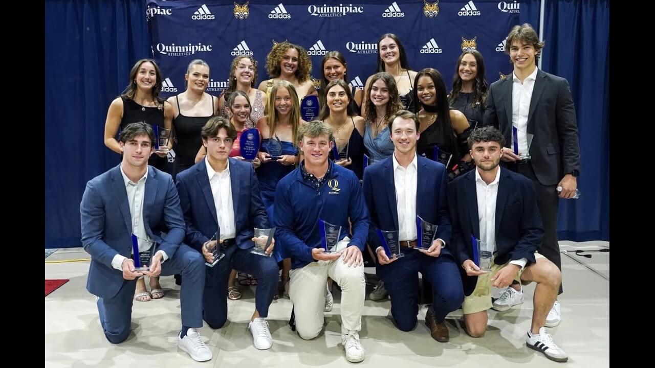 Boomies award-winners line up with their trophies.