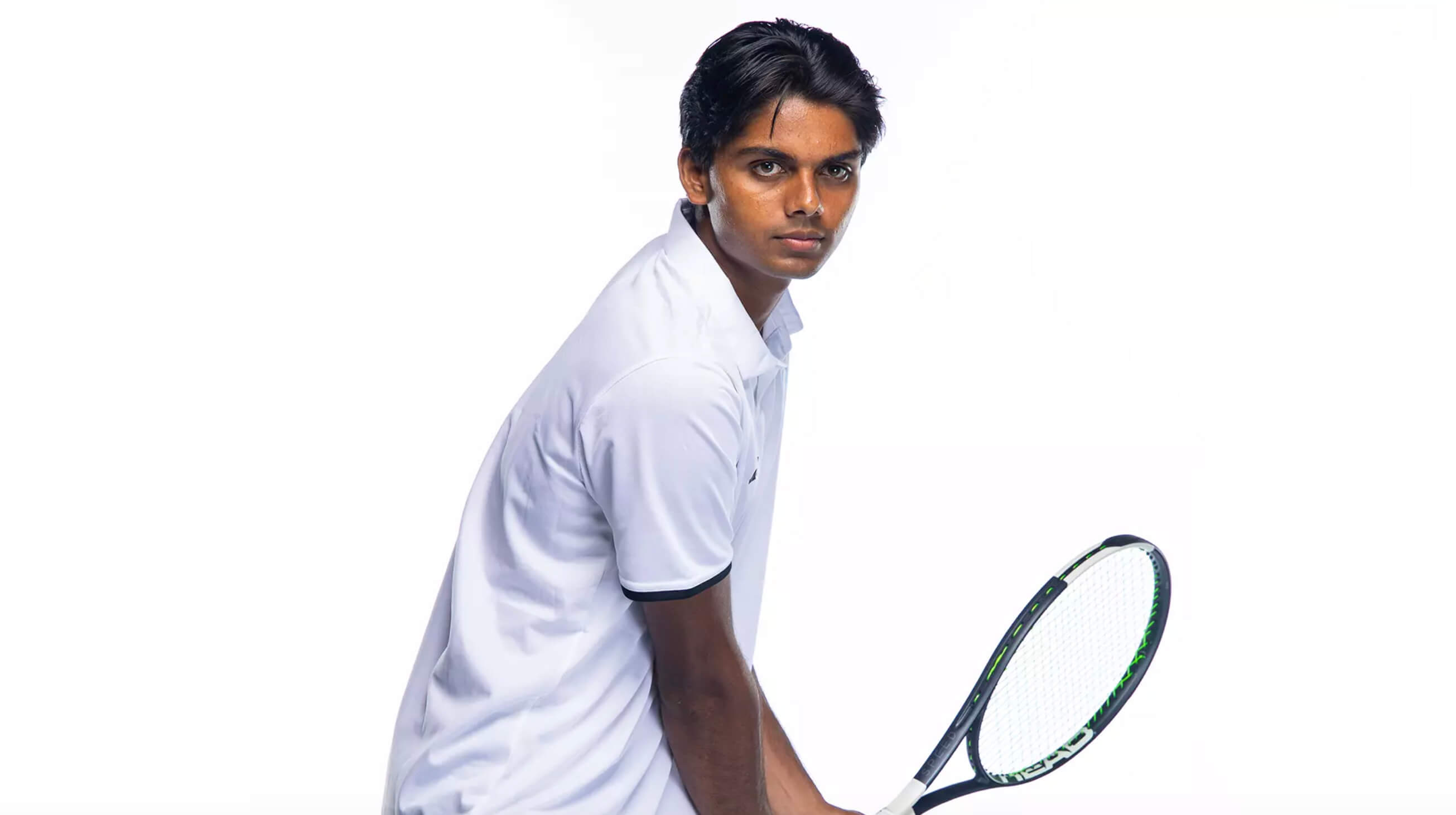 Men's tennis player holding tennis racket