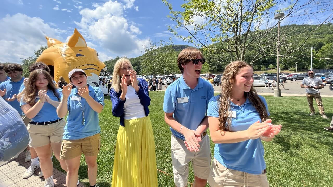 President Marie Hardin and Orientation Leaders cheer as first-years wrap up their orientation