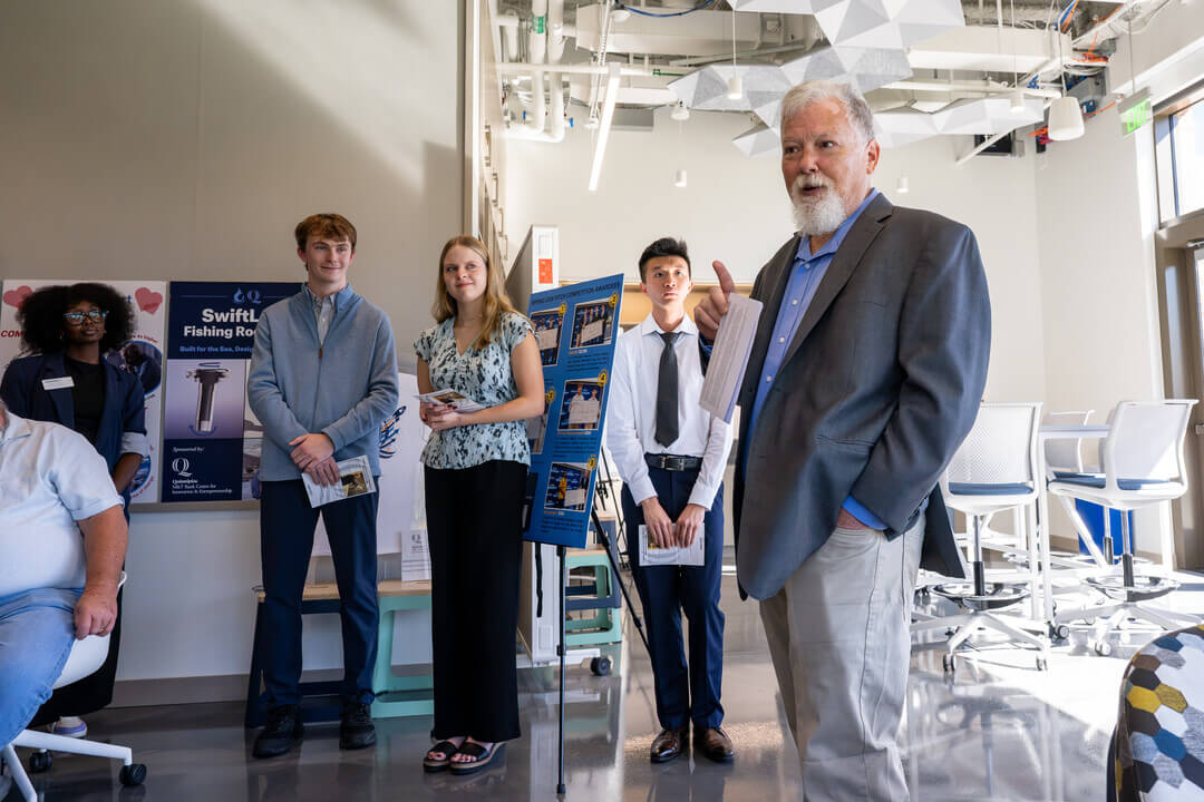 People having conversation during Behavioral Lab ceremony.