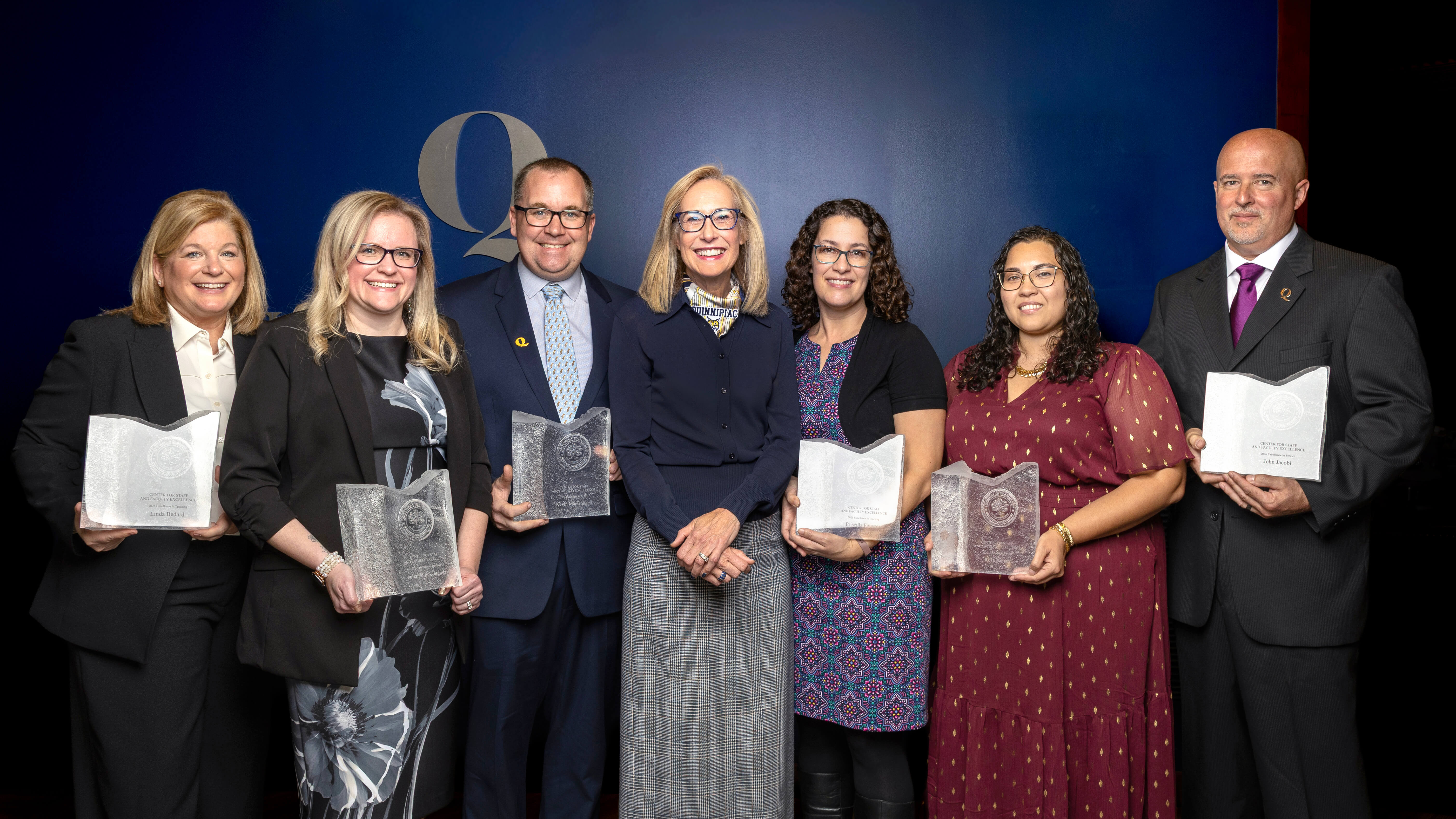 Staff and faculty pose together at the Quinnipiac Center for Staff and Faculty Excellence awards