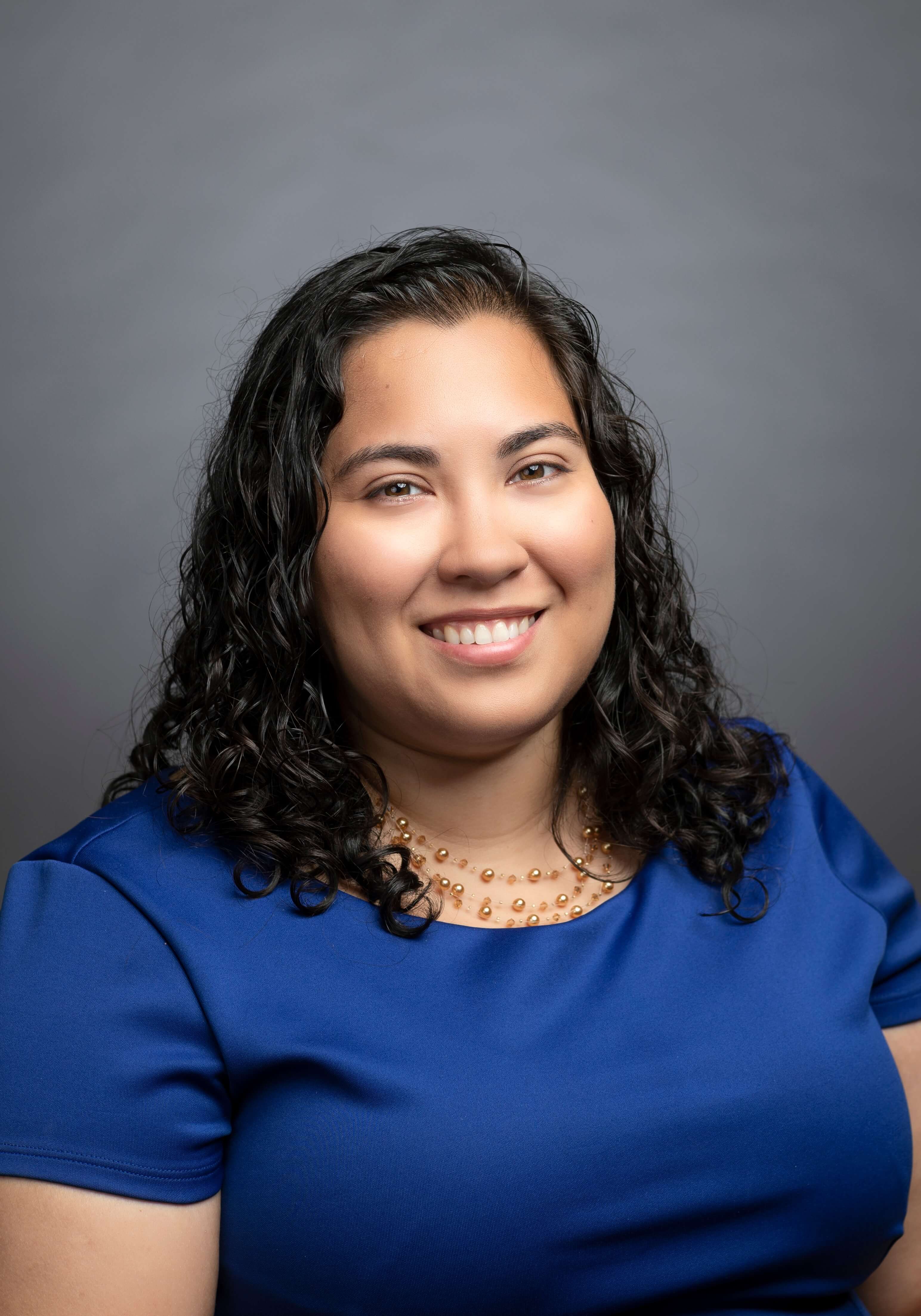 Headshot of Rosa Nieves.