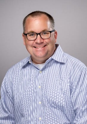 Headshot of Kevin MacDougall.