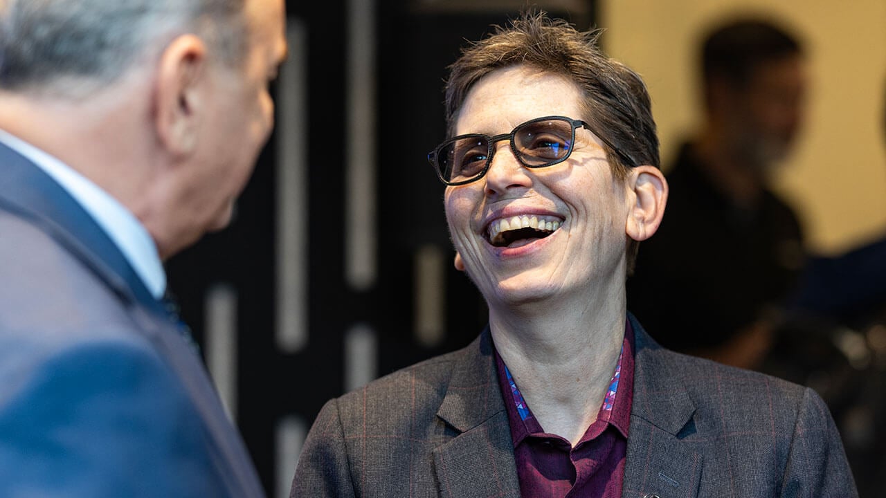 Provost Debra J. Liebowitz smiles in conversation
