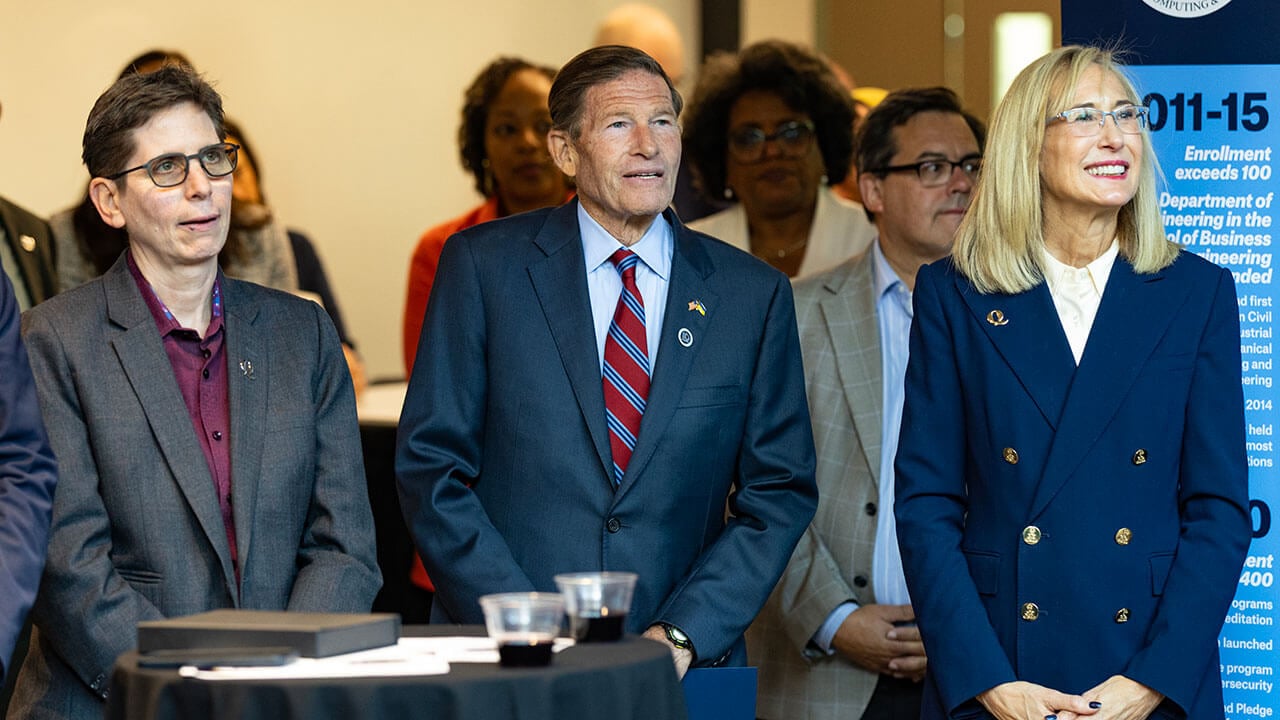 President Marie Hardin, Provost Debra J. Liebowitz and Senator Richard Blumenthal stand together.