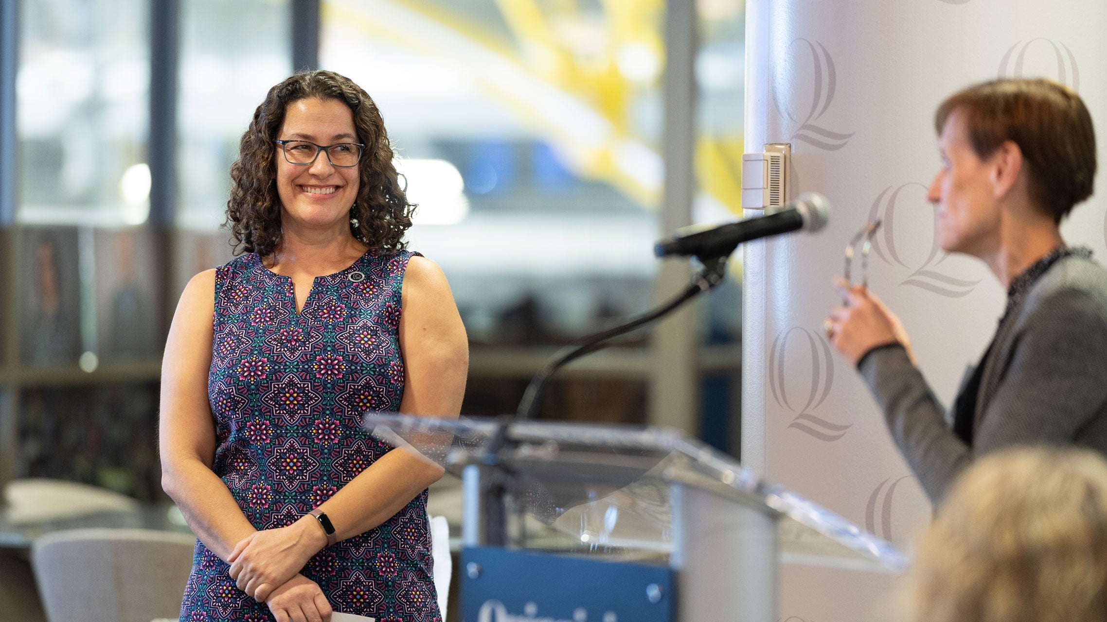 Lynn Byers speaks about recipient Priscilla Fonseca.